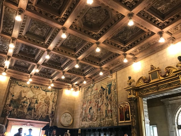 Ornate coffered ceiling with detailed tapestries and classical sculptures in Hearst Castle's grand interior room. — Hearst Castle, Big Sur & the Highway 1 Coast