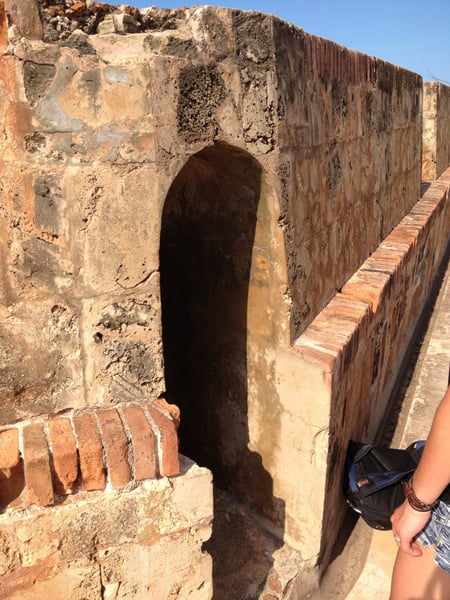 Arched gun emplacement in the stone fortification wall of Castillo San Felipe del Morro, viewed from the interior… — Castillo San Felipe del Morro, San Juan