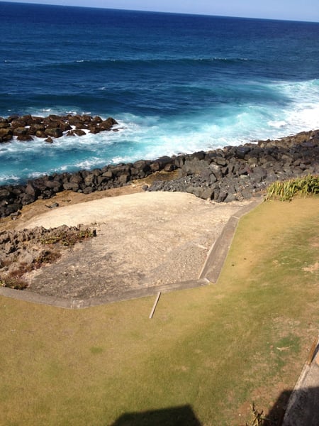 Castillo San Felipe del Morro's grounds and fortification walls overlook rocky coastline and turquoise Atlantic waters… — Castillo San Felipe del Morro, San Juan