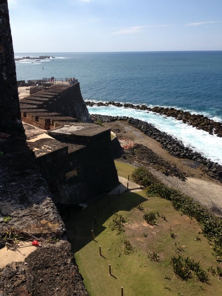 Historic fortification ruins at Castillo San Felipe del Morro overlooking the Atlantic coast and rocky shoreline in San… — Faro del Castillo San Felipe del Morro, San Juan