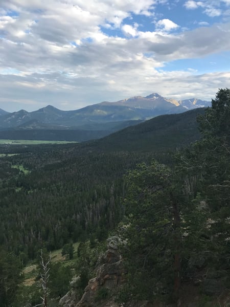 Mountain valley with coniferous forest and snow-capped peaks viewed from Many Parks Curve Overlook in Estes Park… — Many Parks Curve Overlook, Rocky Mountain National Park