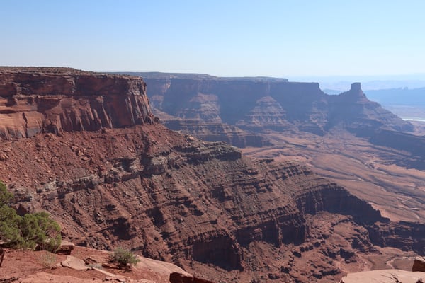 Layered red rock formations and mesas in the Moab region, viewed from an elevated plateau overlooking a vast desert… — Dead Horse Point State Park, Moab, Arches & Canyonlands