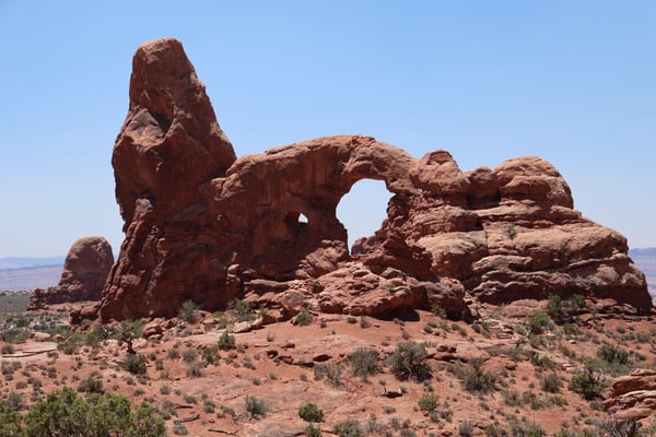 Balanced Rock, a distinctive natural sandstone arch formation in Arches National Park, viewed from the ground level… — Moab, Arches & Canyonlands