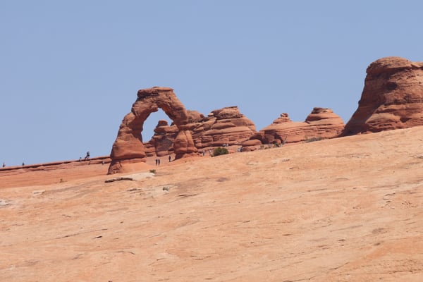 Delicate Arch viewed from the Lower Viewpoint in Moab, Utah, a distinctive natural sandstone formation against a clear… — Lower Delicate Arch Viewpoint, Moab, Arches & Canyonlands