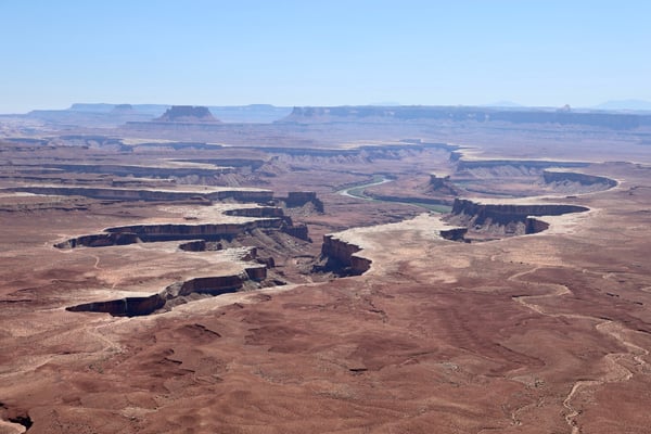 Aerial view of the Green River winding through layered canyon formations at Green River Overlook near Moab, Utah. — Green River Overlook, Moab, Arches & Canyonlands