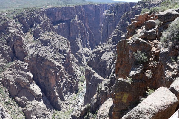 Deep rocky canyon with columnar formations viewed from an elevated viewpoint at Chasm View, Colorado. — Chasm View, Black Canyon of the Gunnison