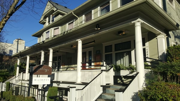 Historic Victorian mansion with white columns and wraparound porch, now housing Paley's Place restaurant in Portland. — Northwest District, Portland
