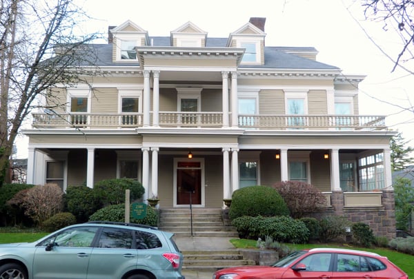 Bates-Seller House, a classical revival mansion with columned portico and mansard roof, photographed from the street in… — Northwest District, Portland